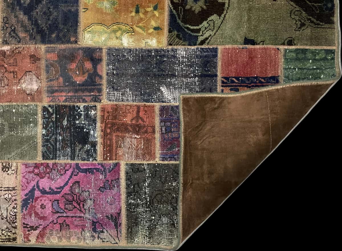 Persian rug of Patchwork style in dimensions 220 centimeters length by 168 centimeters width with mainly colorful colors — Folded