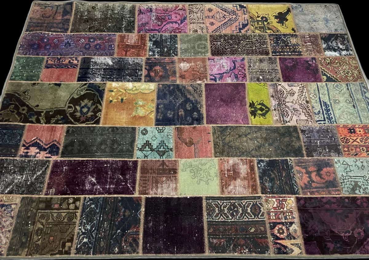 Persian rug of Patchwork style in dimensions 220 centimeters length by 168 centimeters width with mainly colorful colors — Perspective