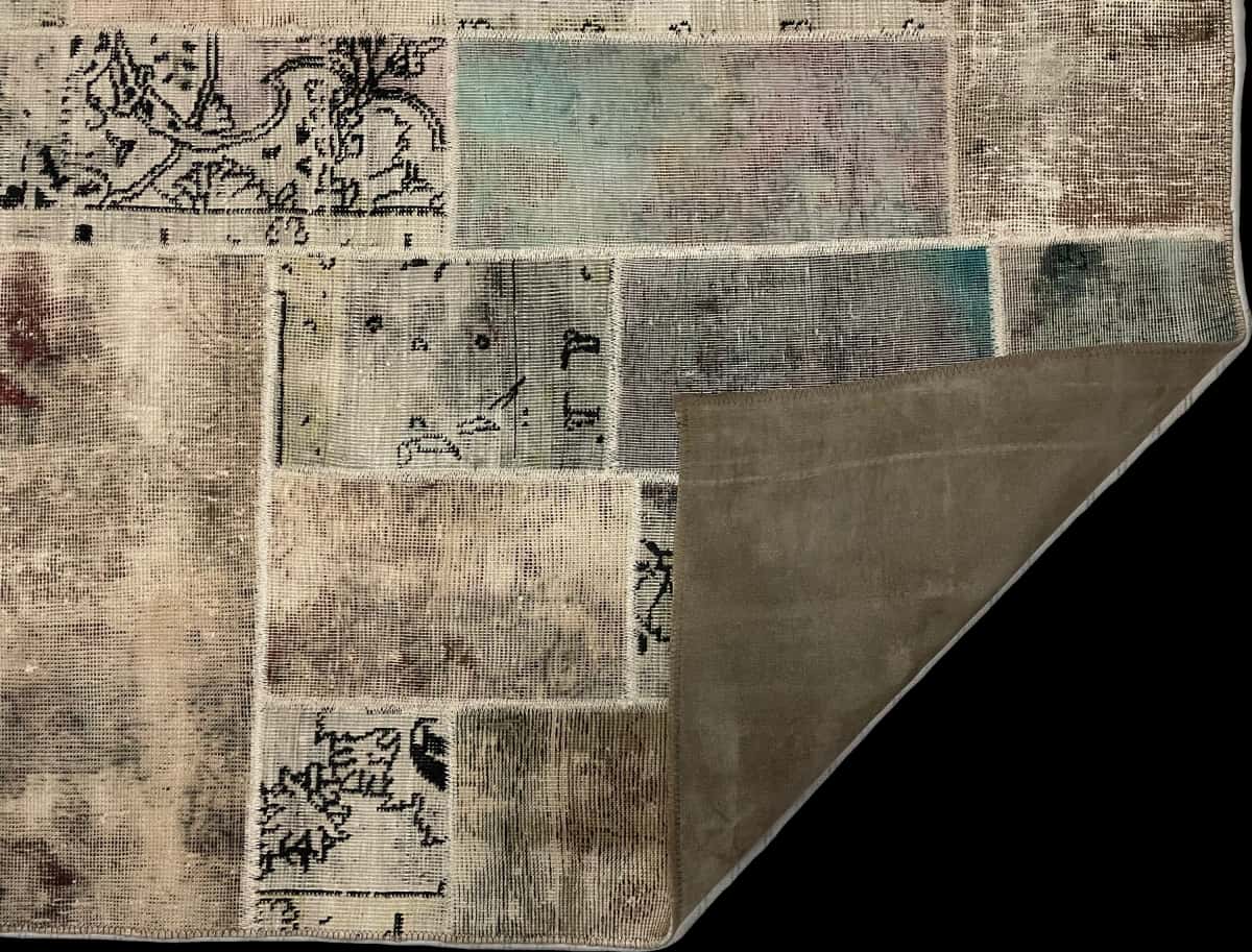 Persian rug of Patchwork style in dimensions 180 centimeters length by 123 centimeters width with mainly beige and green colors — Folded
