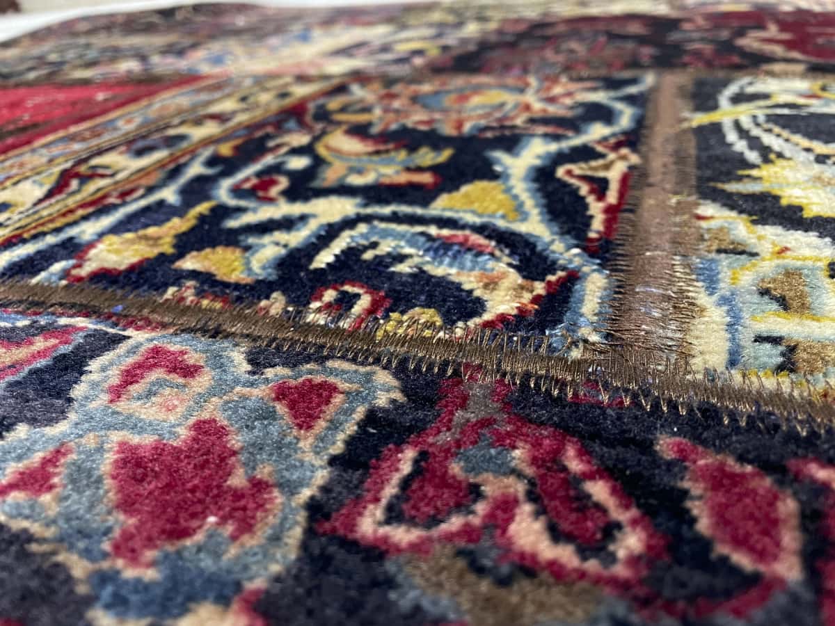 alfombra persa de estilo patchwork en dimensiones 206 centímetros de largo por 150 centímetros de ancho — Primer plano de la textura
