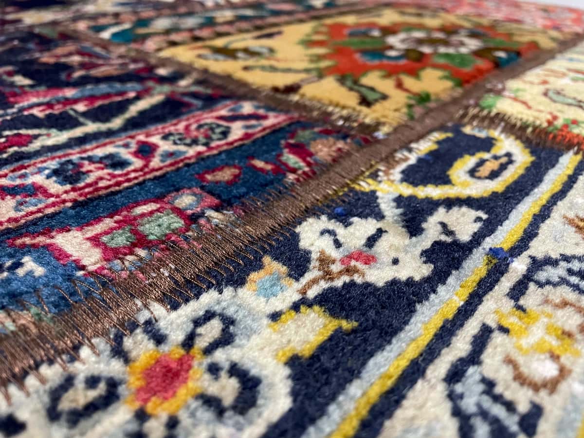 Persian rug of Rey style in dimensions 202 centimeters length by 150 centimeters width with mainly colorful colors — Texture close-up