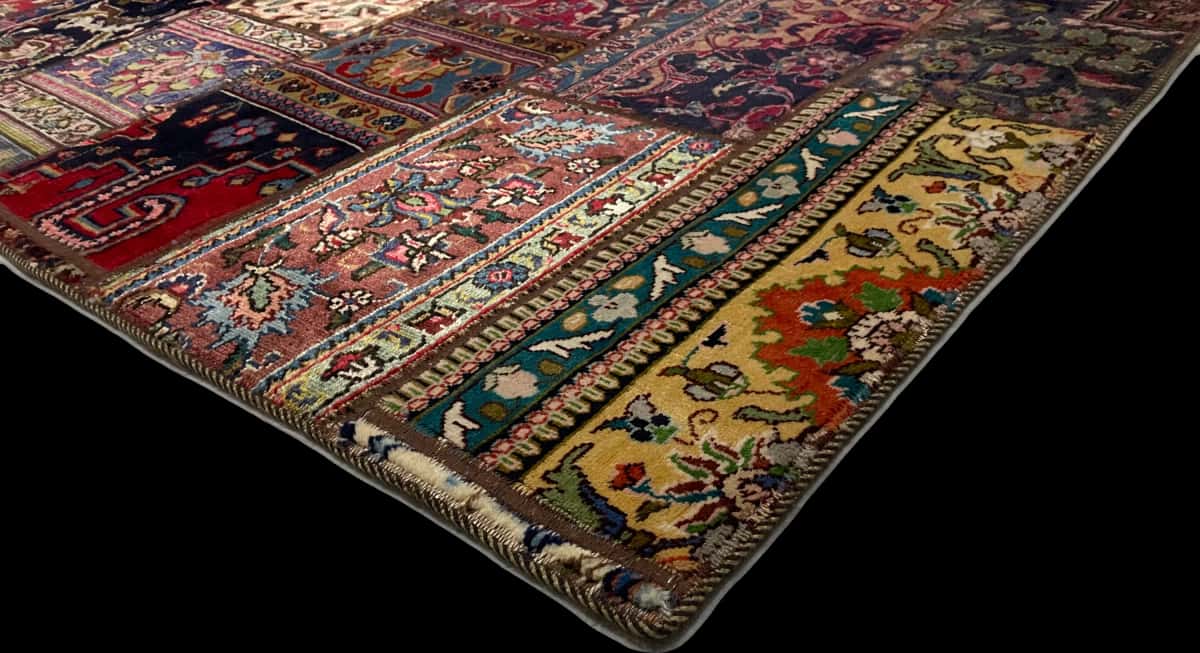 Persian rug of Patchwork style in dimensions 231 centimeters length by 151 centimeters width with mainly red and green colors — Corner & edge