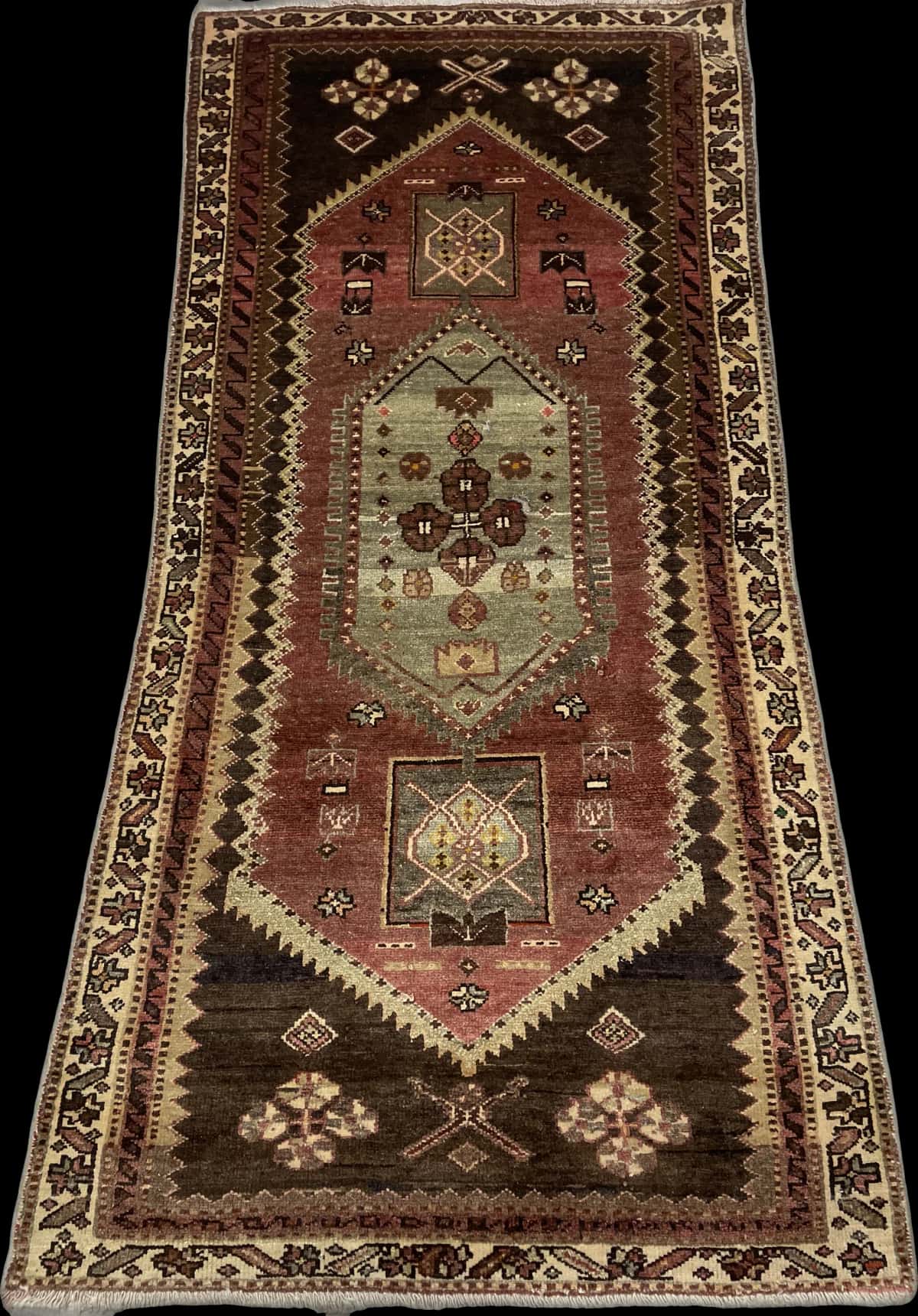 Persian rug of Zanjan style in dimensions 215 centimeters length by 100 centimeters width with mainly green and brown colors — Perspective