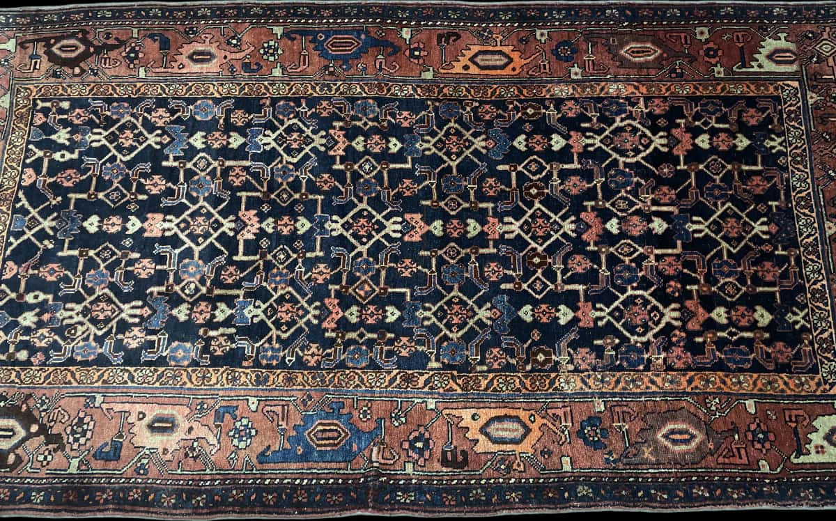 Persian rug of Borujerd style in dimensions 244 centimeters length by 130 centimeters width with mainly blue and brown colors — Perspective