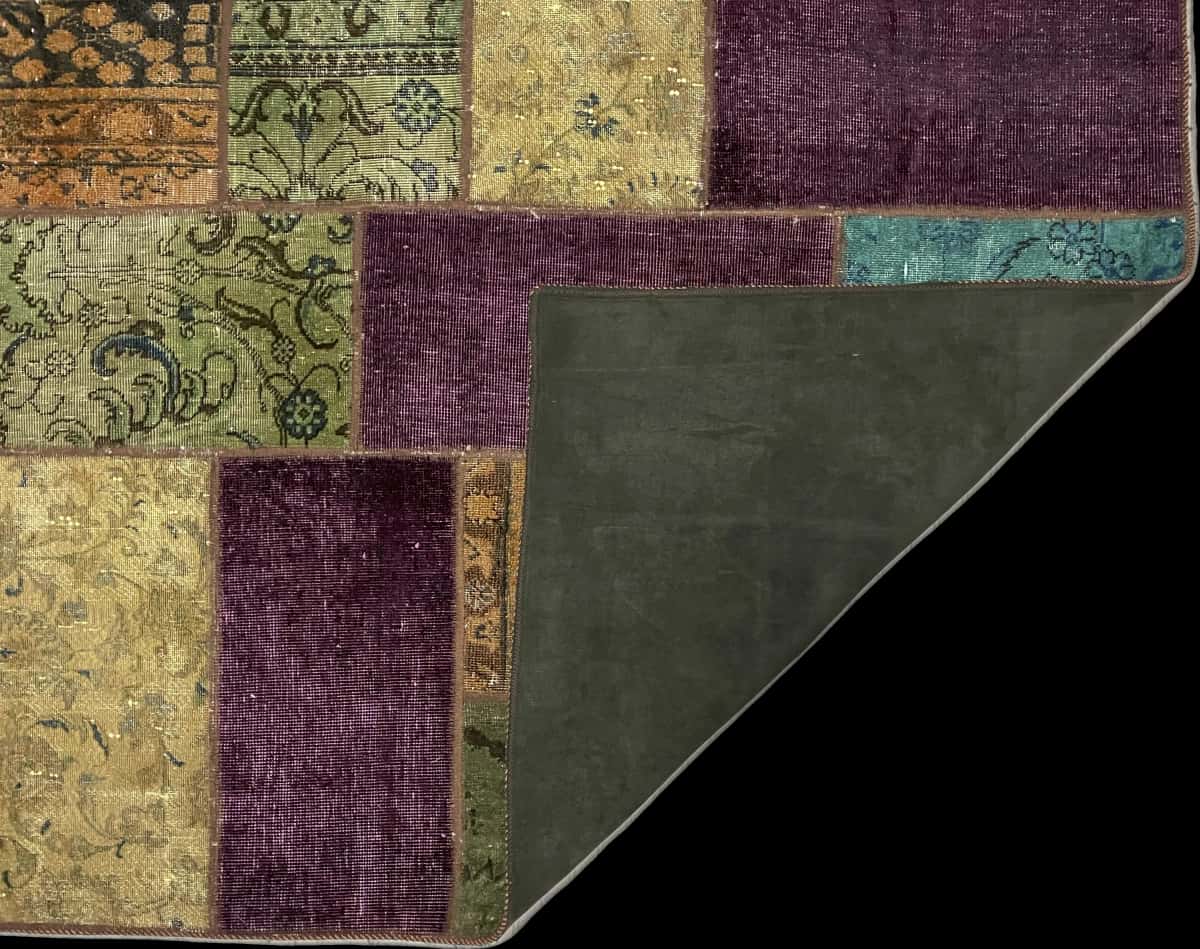 alfombra persa de estilo patchwork en dimensiones 210 centímetros de largo por 152 centímetros de ancho con colores principalmente colorido — Plegada