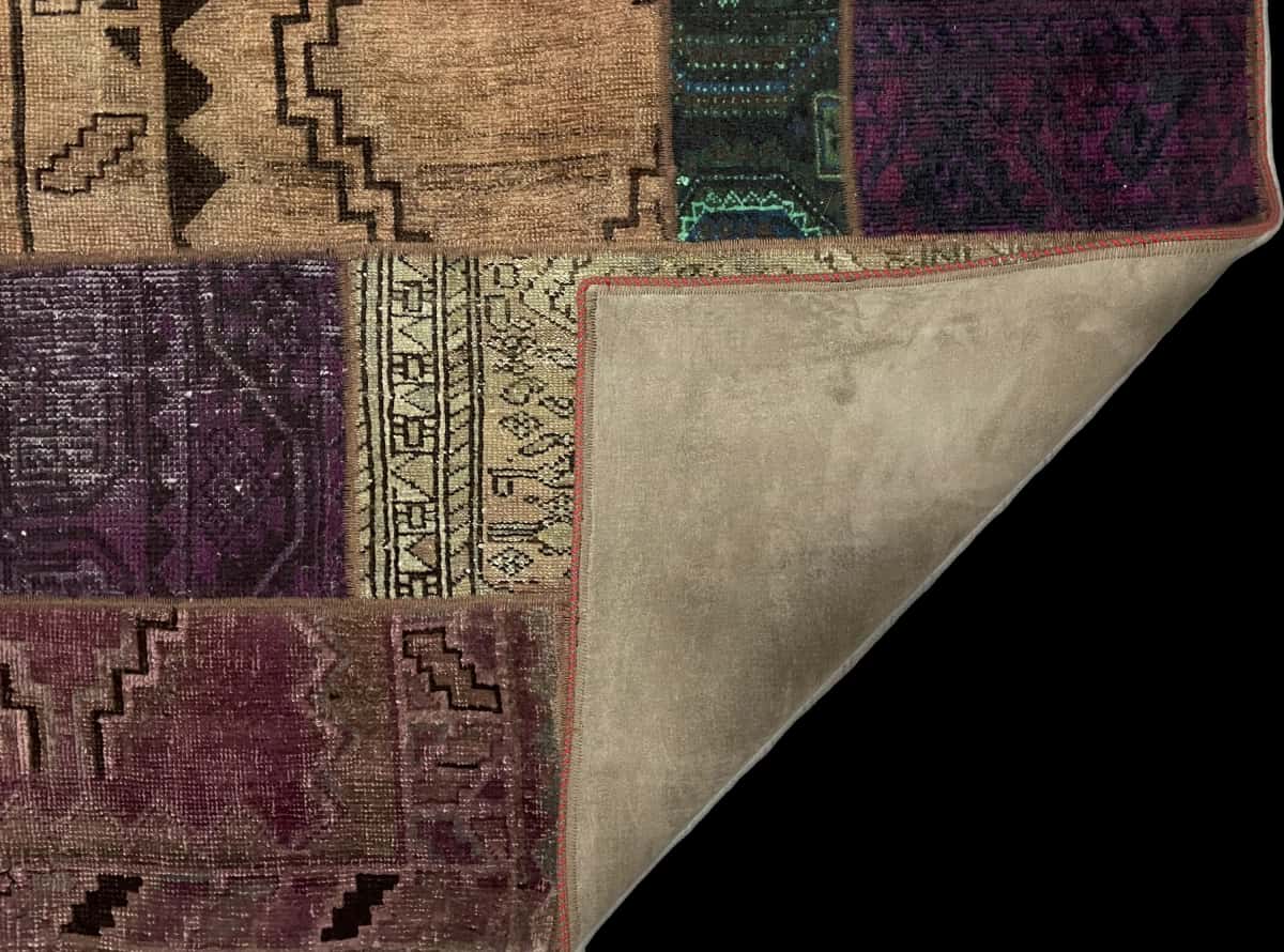 Persian rug of Patchwork style in dimensions 206 centimeters length by 150 centimeters width with mainly green and purple colors — Folded