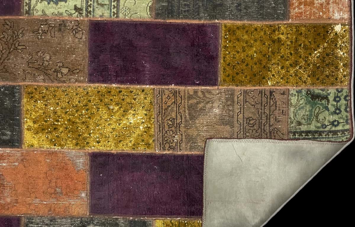 Persian rug of Patchwork style in dimensions 200 centimeters length by 153 centimeters width with mainly colorful colors — Folded