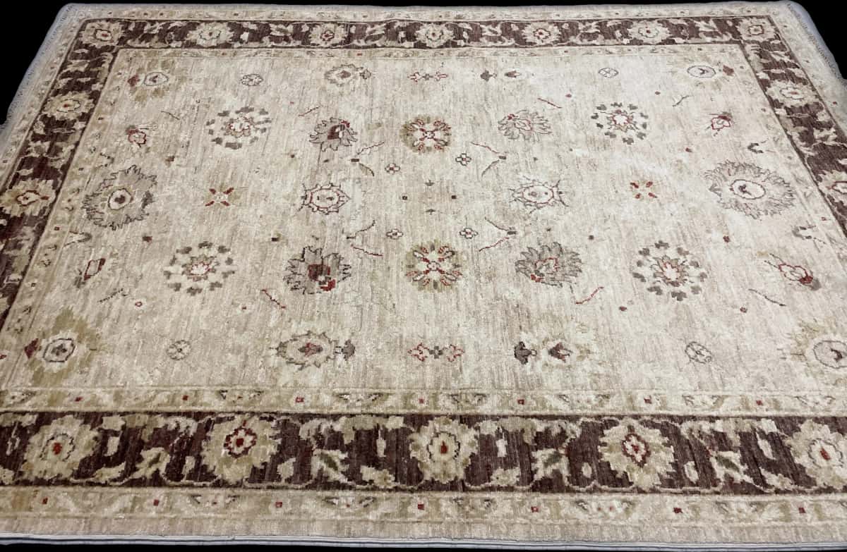 Pakistan rug in dimensions 205 centimeters length by 144 centimeters width with mainly yellow and brown colors — Perspective