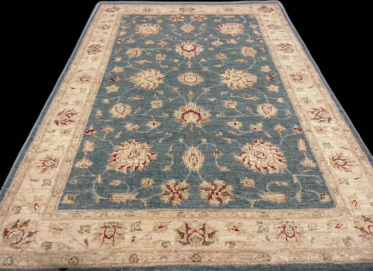 Pakistan rug in dimensions 200 centimeters length by 139 centimeters width with mainly blue and yellow colors — Perspective