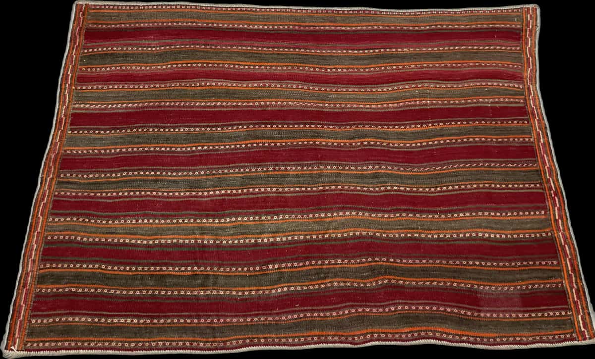 Persian rug of Sumak style in dimensions 177 centimeters length by 131 centimeters width with mainly red and orange colors — Perspective