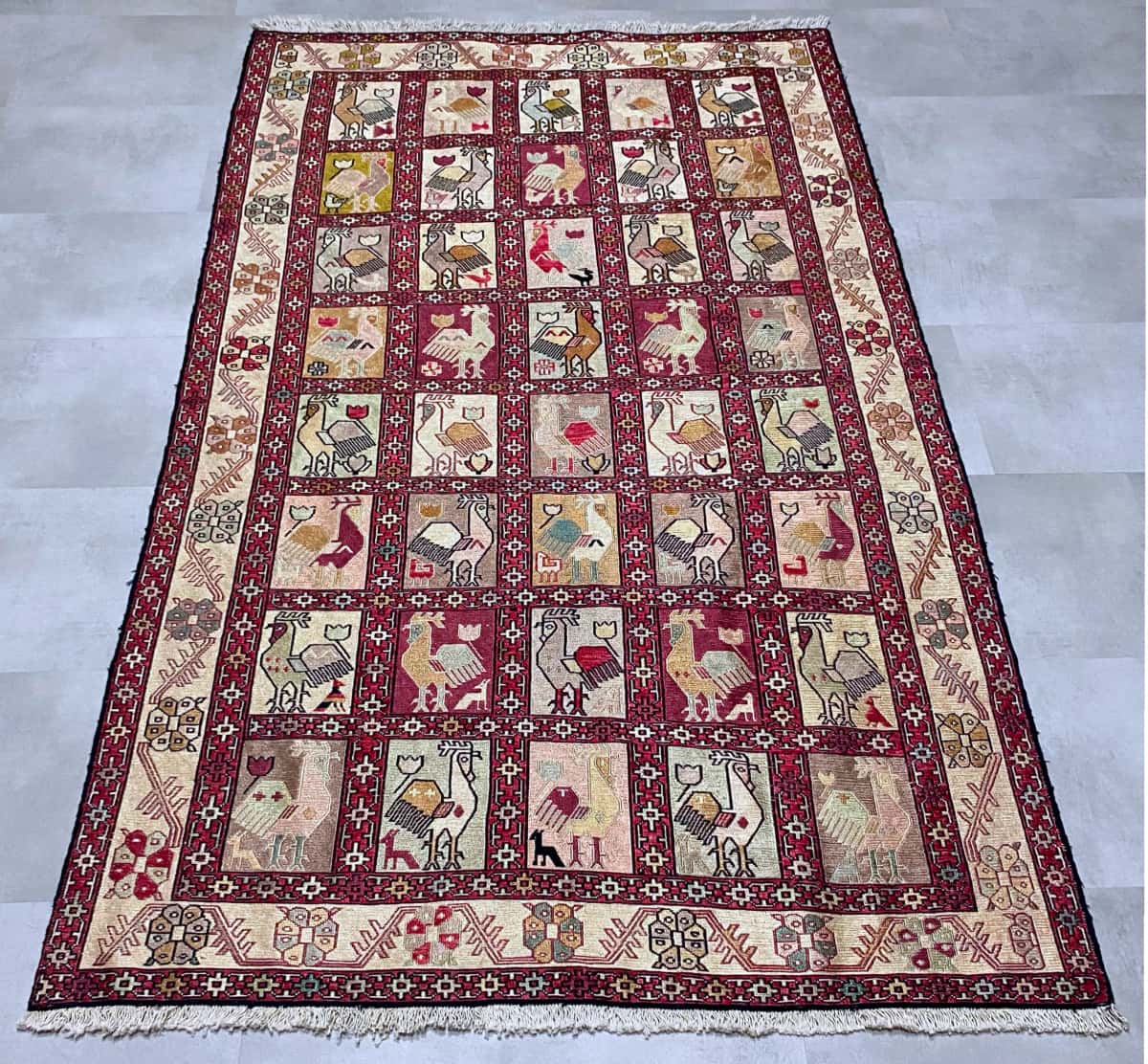 Persian rug in dimensions 188 centimeters length by 118 centimeters width with mainly beige and red colors — Perspective