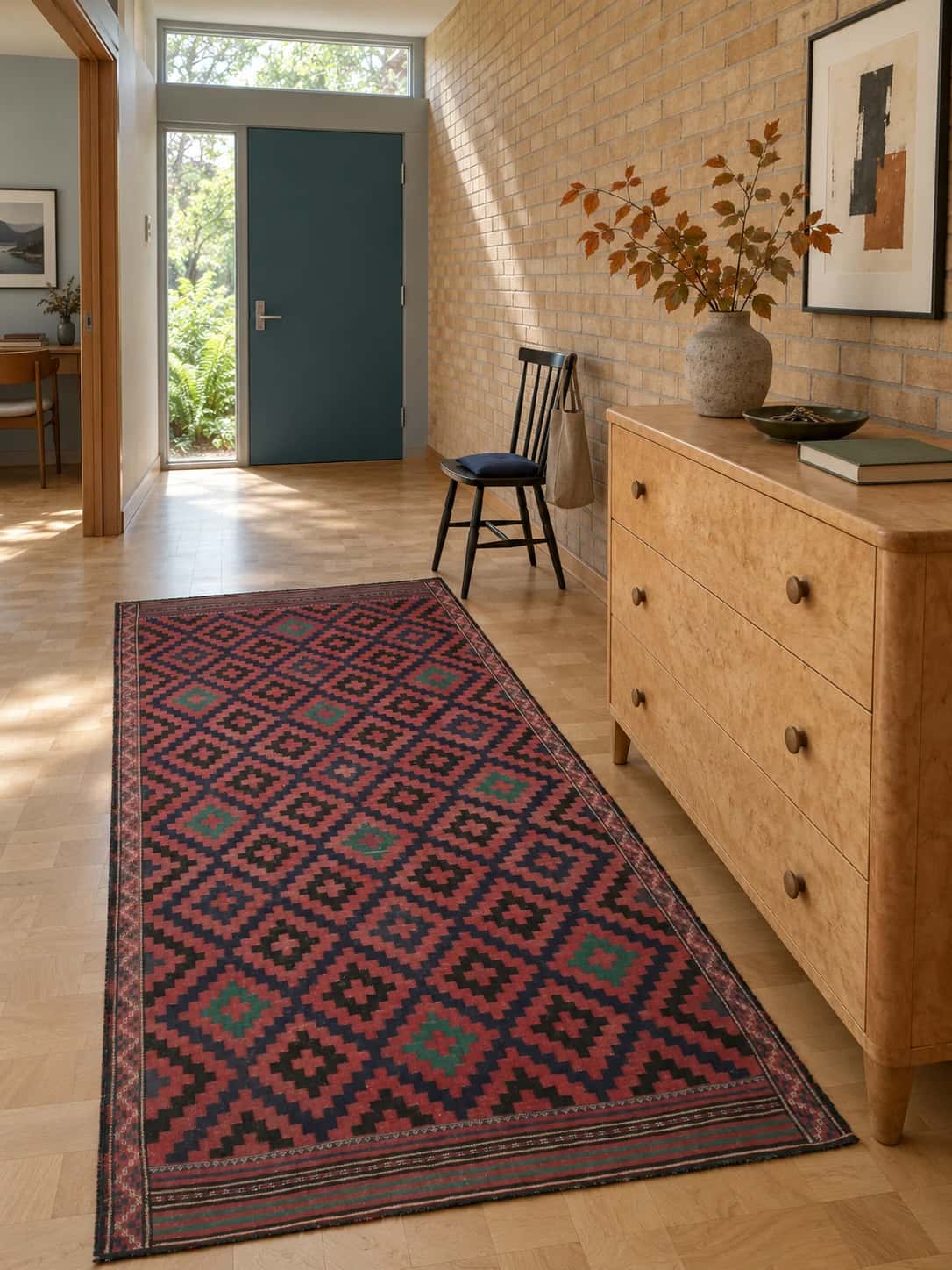 Persian Sumak Kilim rug, geometric, 135x270 cm, mainly red and black — In a room