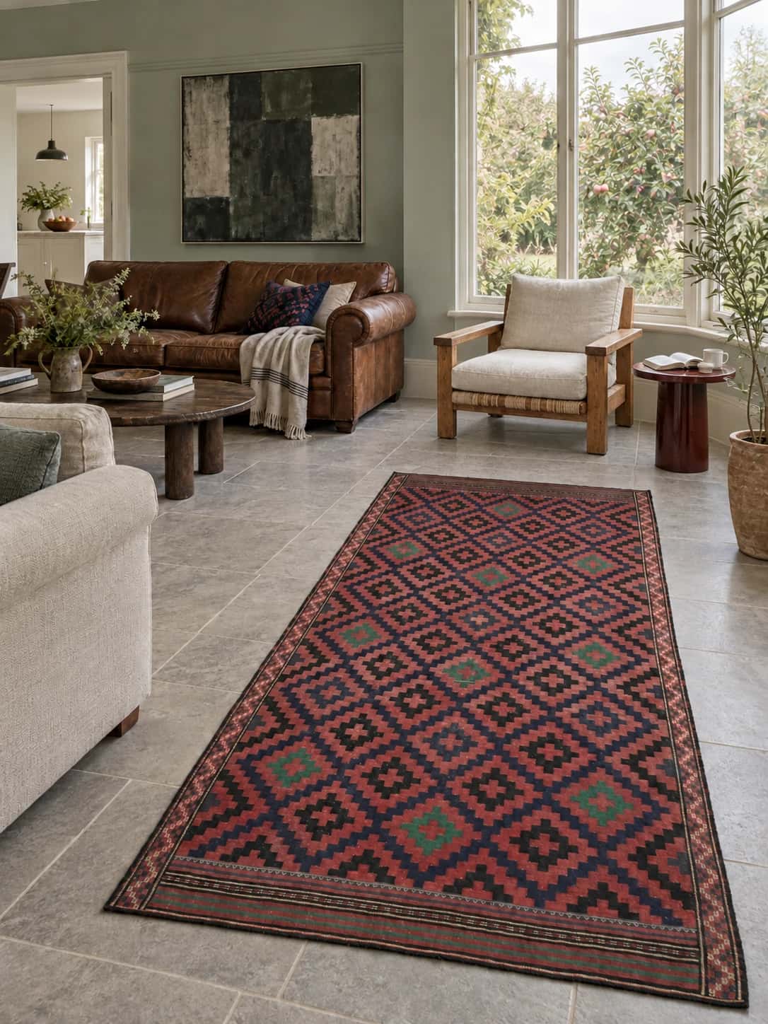 Persian Sumak Kilim rug, geometric, 135x270 cm, mainly red and black — In a room