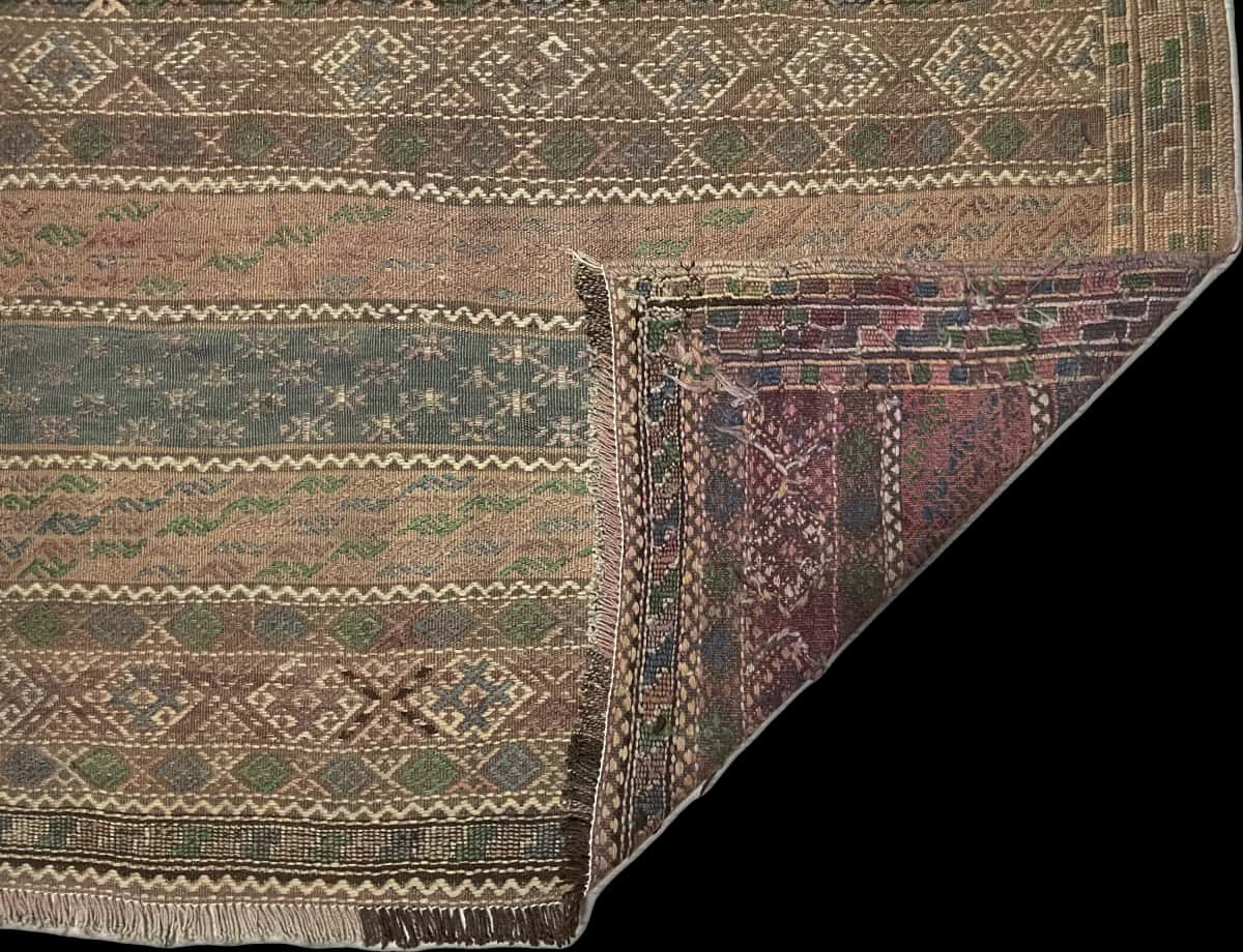Persian rug of Sumak style in dimensions 233 centimeters length by 150 centimeters width with mainly brown colors — Folded