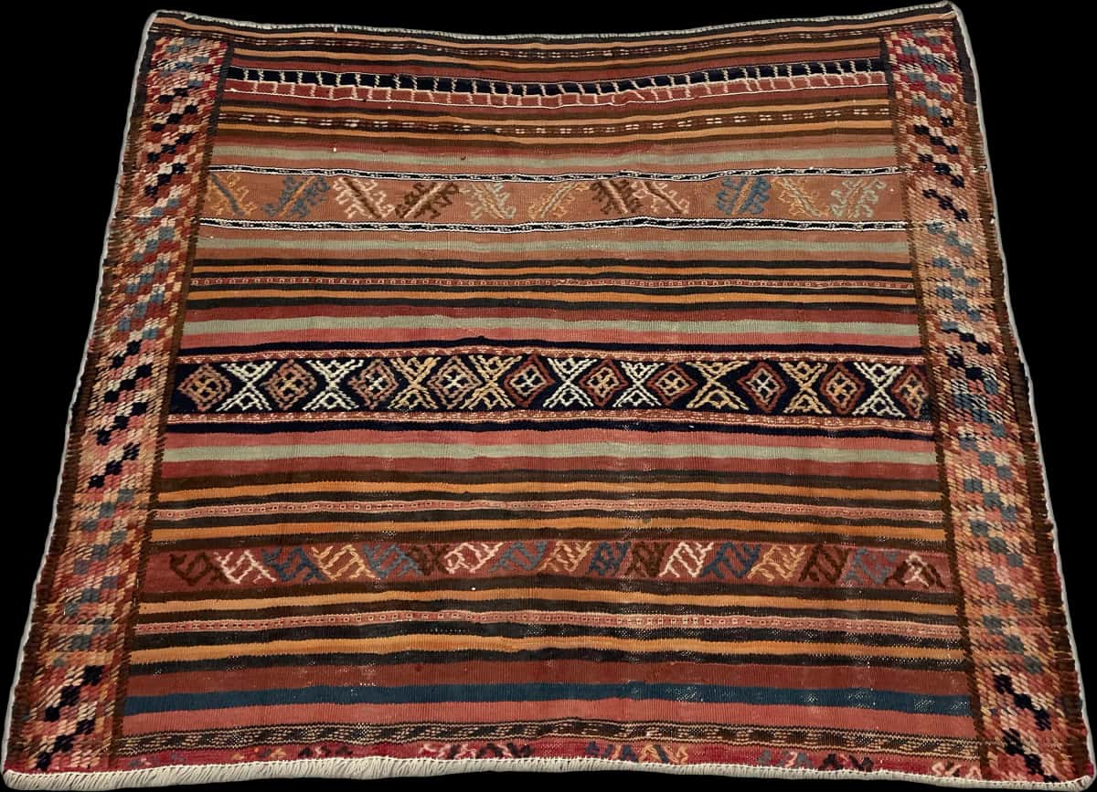 Persian rug of Sumak style in dimensions 128 centimeters length by 113 centimeters width with mainly brown and red colors — Perspective