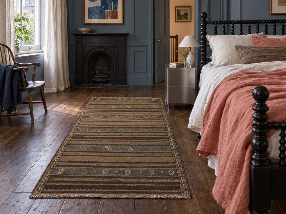 Persian Sumak Kilim rug, 126x230 cm, mainly brown — In a room