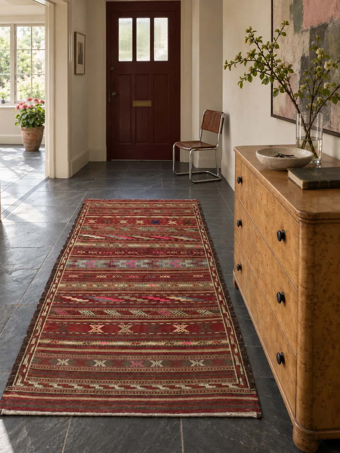 Persian Sumak Kilim rug, geometric, 113x222 cm, multicoloured — In a room