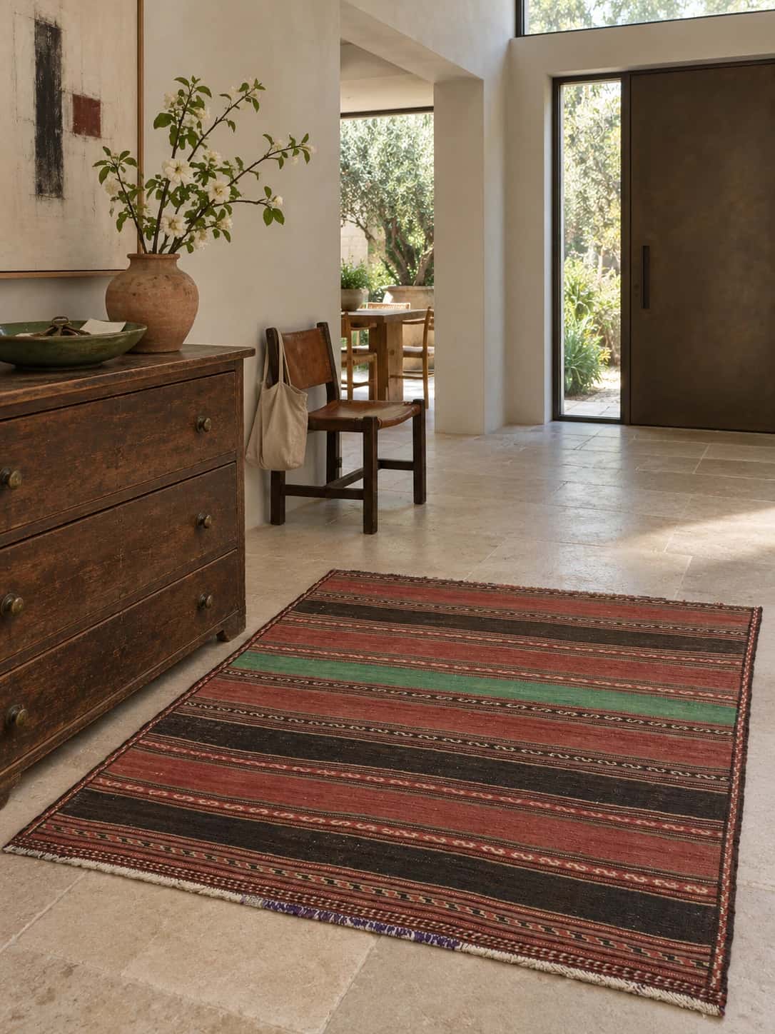 Persian Sumak Kilim rug, 130x142 cm, mainly red and brown — In a room