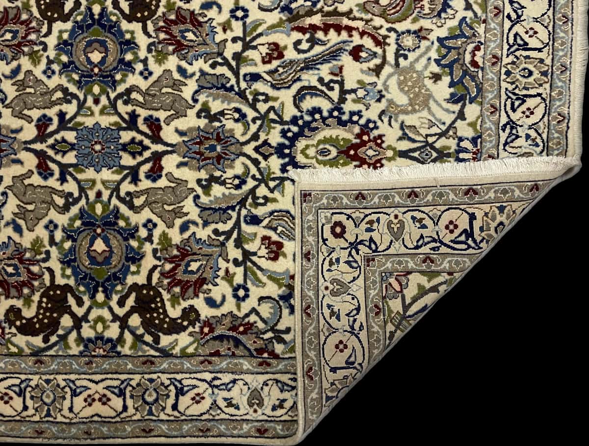 Persian rug of Nain style in dimensions 200 centimeters length by 192 centimeters width with mainly beige and blue colors — Folded