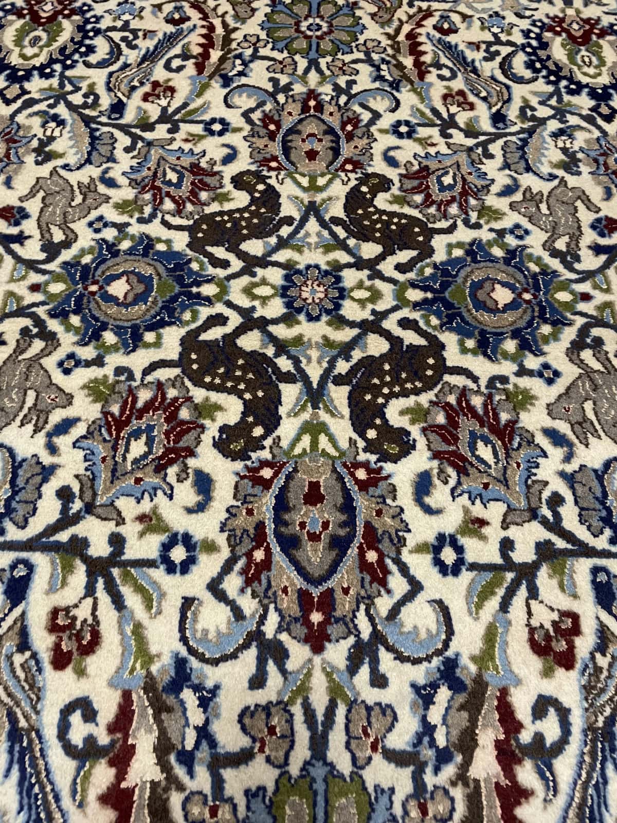 Persian rug of Nain style in dimensions 200 centimeters length by 192 centimeters width with mainly beige and blue colors — Texture close-up