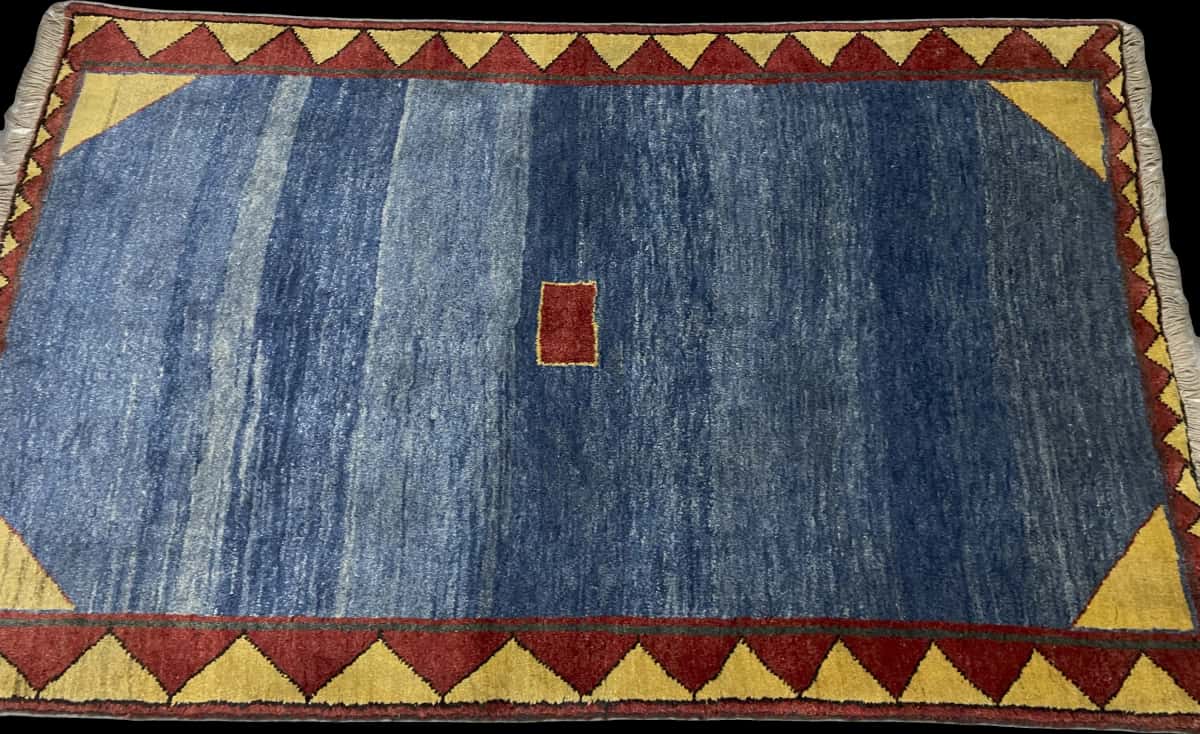 Persian rug of Gabbeh style in dimensions 200 centimeters length by 128 centimeters width with mainly blue colors — Perspective