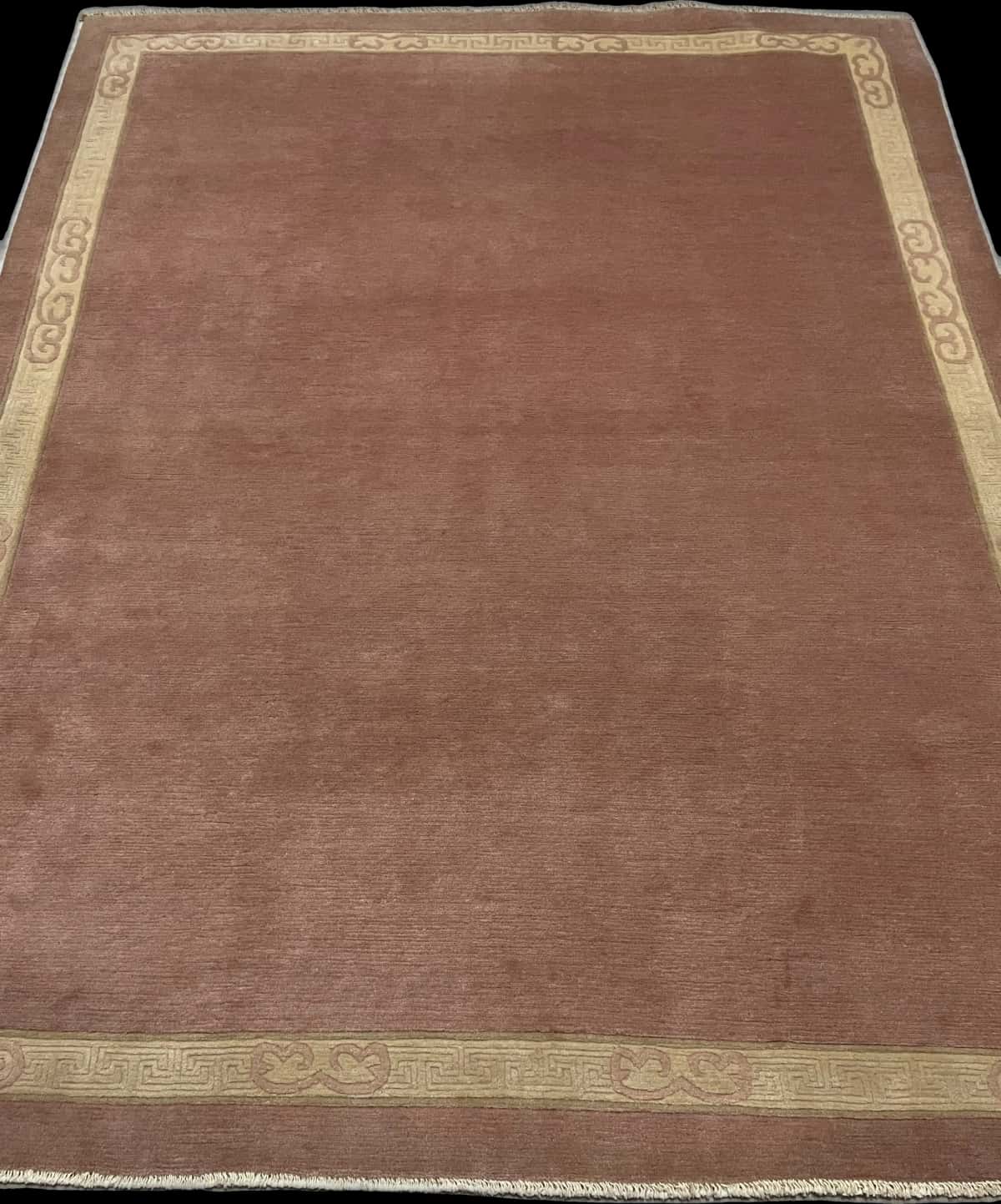 Nepali rug of Tibetan style in dimensions 255 centimeters length by 202 centimeters width with mainly pink colors — Perspective