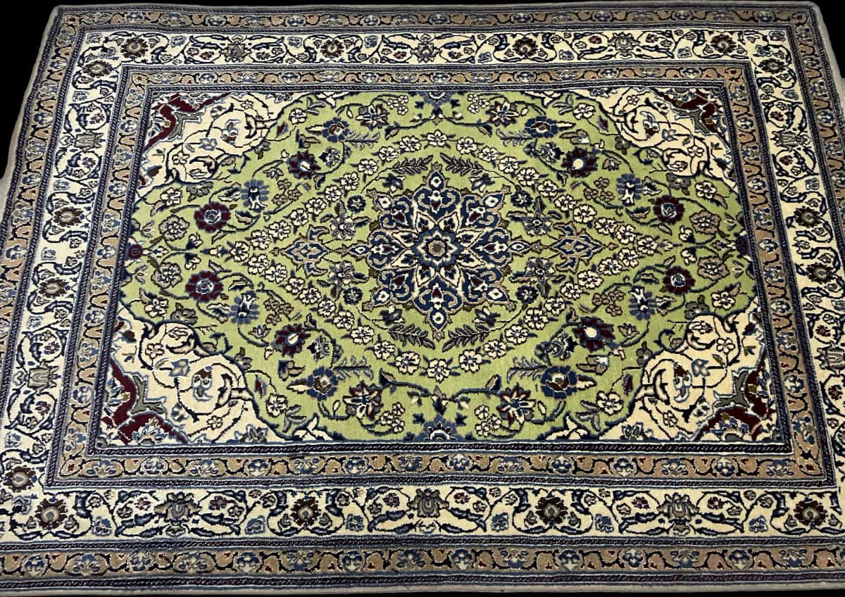 Persian rug of Nain style in dimensions 208 centimeters length by 146 centimeters width with mainly green and blue colors — Perspective