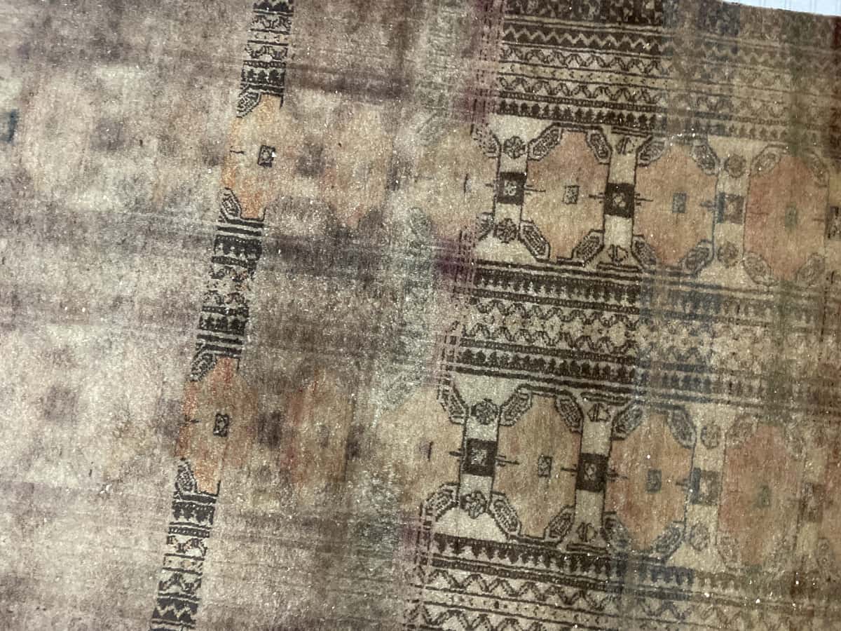 Persian rug of Baluch style in dimensions 182 centimeters length by 94 centimeters width with mainly brown colors — Perspective