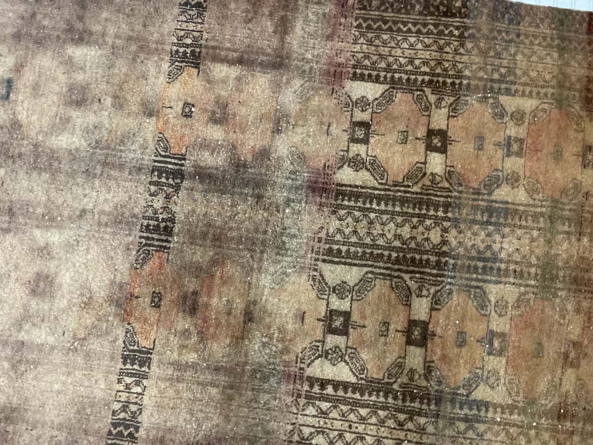 Persian rug of Baluch style in dimensions 182 centimeters length by 94 centimeters width with mainly brown colors — Perspective
