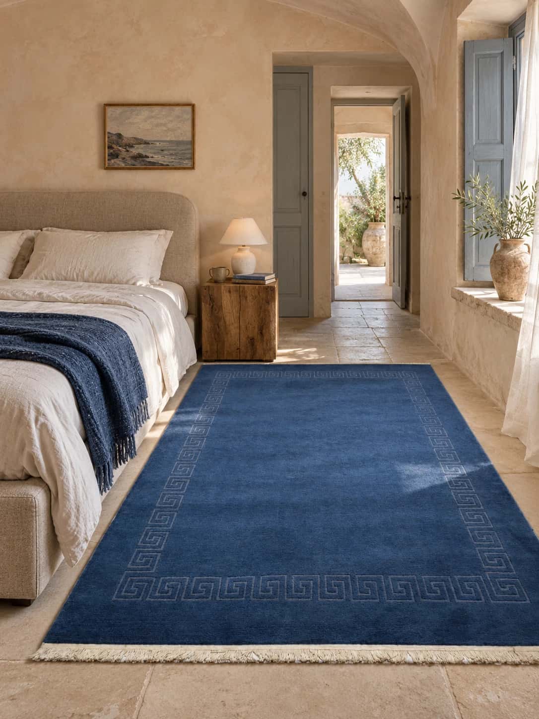 Alfombra nepalí tibetana, geométrica, 170x241 cm, principalmente en azul — En una habitación