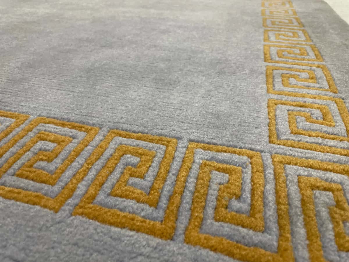 Nepali rug of Tibetan style in dimensions 206 centimeters length by 150 centimeters width with mainly blue colors — Texture close-up