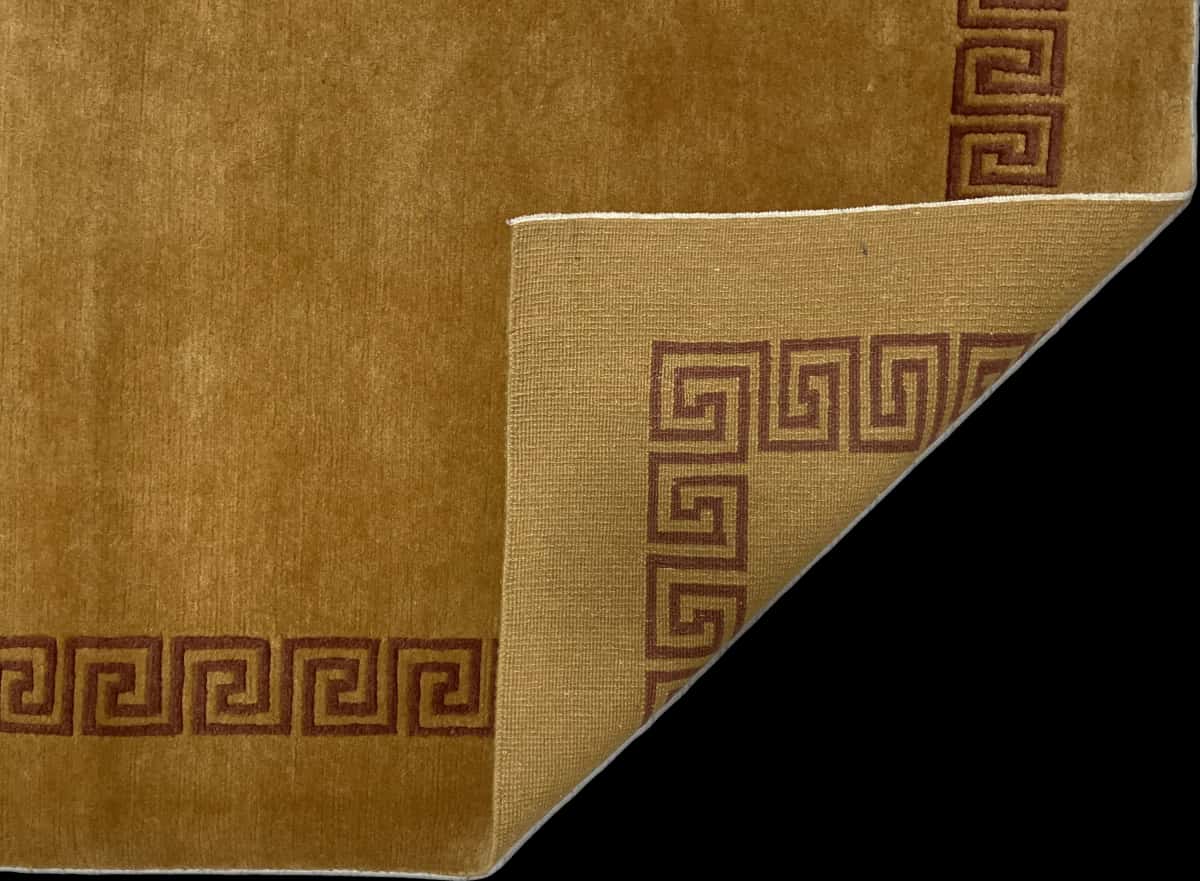 Nepali rug of Tibetan style in dimensions 202 centimeters length by 150 centimeters width with mainly yellow colors — Folded