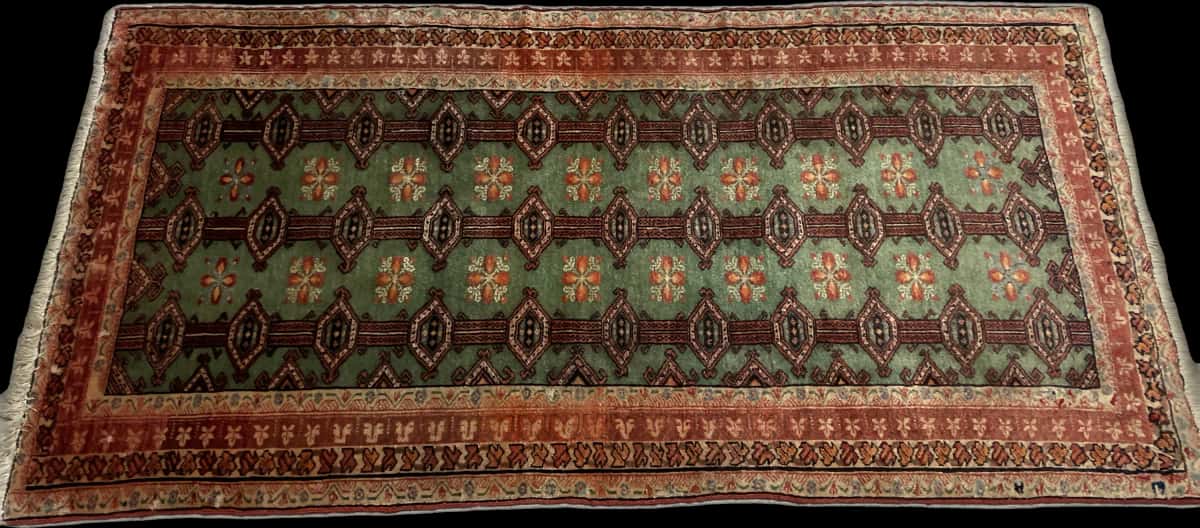 Persian rug of Turkoman style in dimensions 179 centimeters length by 94 centimeters width with mainly green and red colors — Perspective