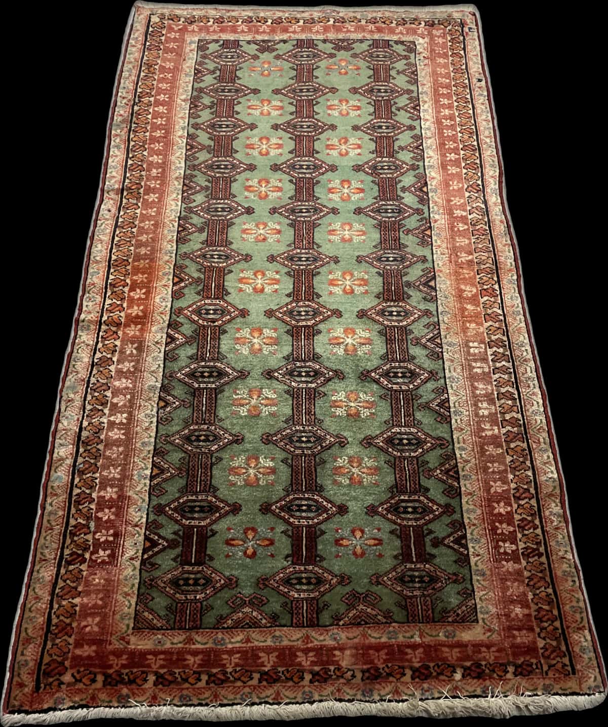 Persian rug of Turkoman style in dimensions 179 centimeters length by 94 centimeters width with mainly green and red colors — Perspective