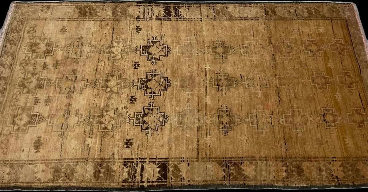 Persian rug of Baluch style in dimensions 220 centimeters length by 117 centimeters width with mainly brown colors — Perspective