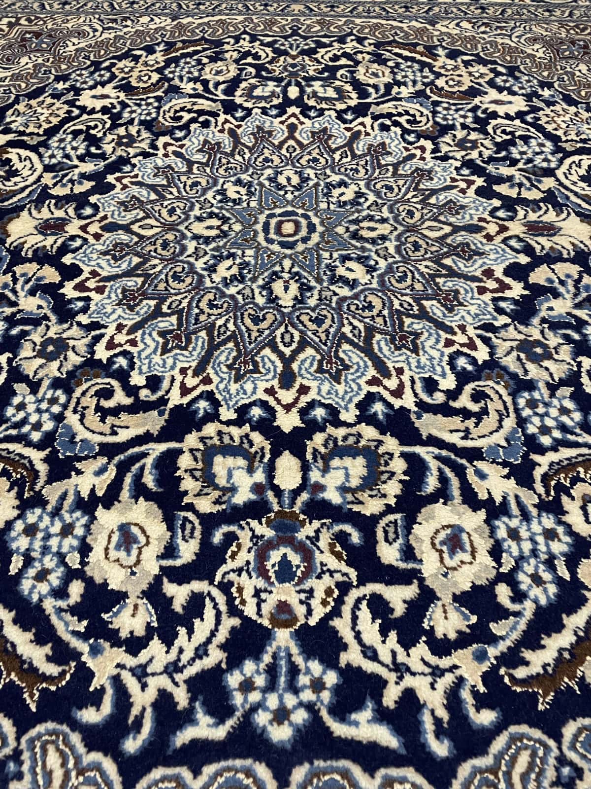Persian rug of Nain style in dimensions 208 centimeters length by 198 centimeters width with mainly beige and blue colors — Perspective