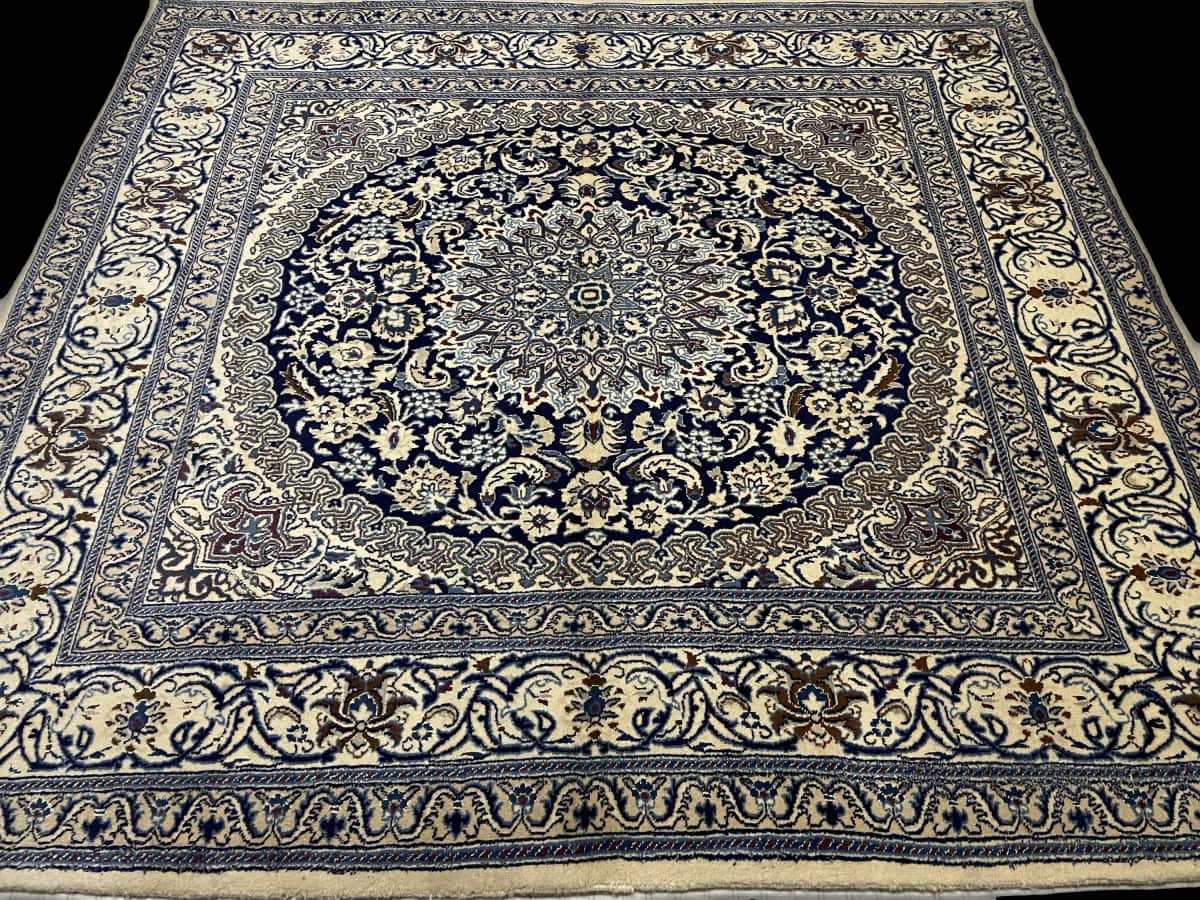 Persian rug of Nain style in dimensions 208 centimeters length by 198 centimeters width with mainly beige and blue colors — Perspective