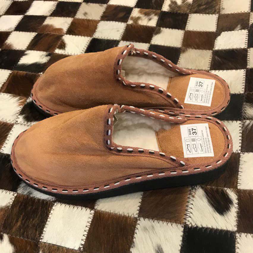 zapatos con colores principalmente marrón — Perfil
