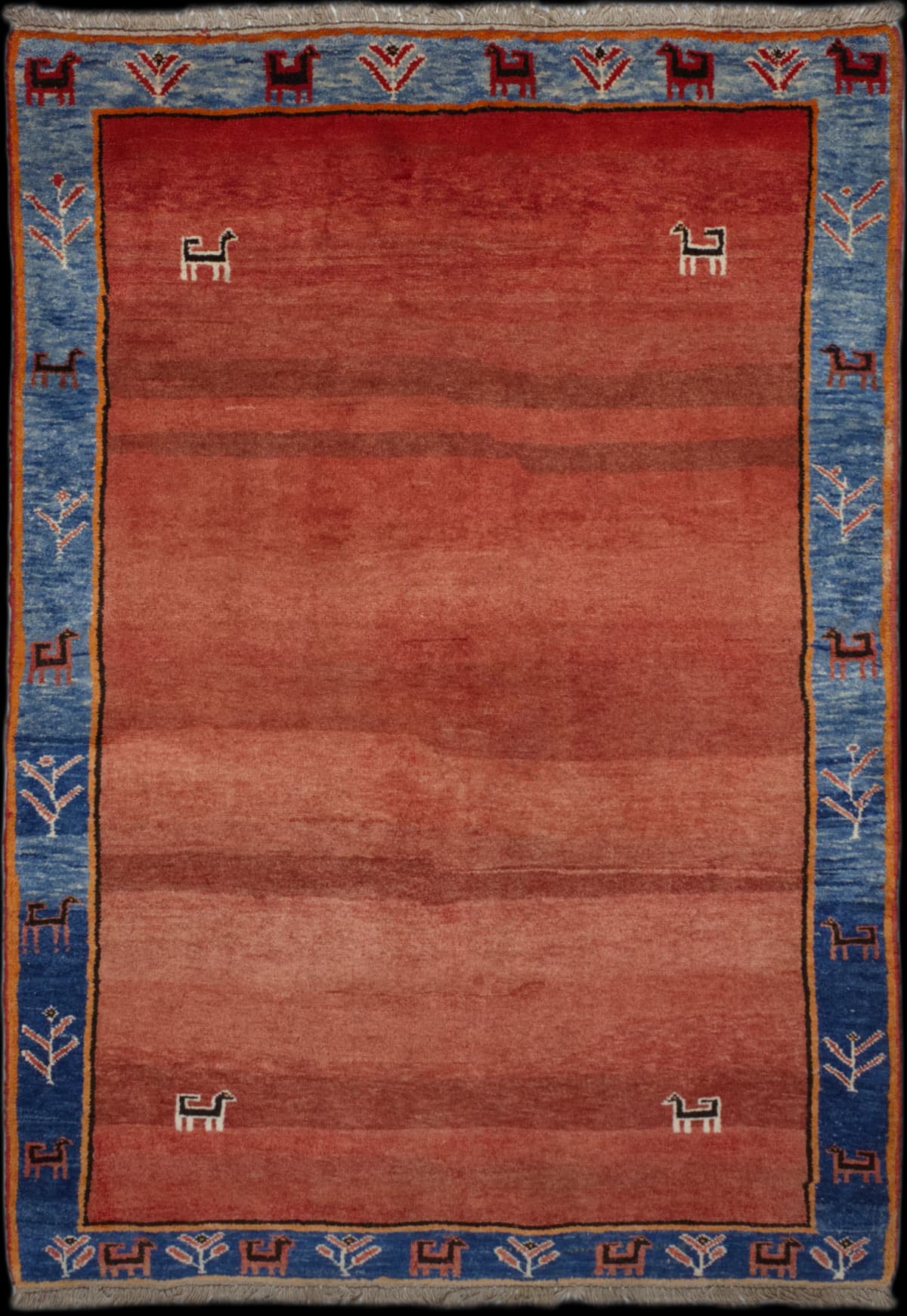 Persian rug of Gabbeh style in dimensions 275 centimeters length by 175 centimeters width with mainly red colors