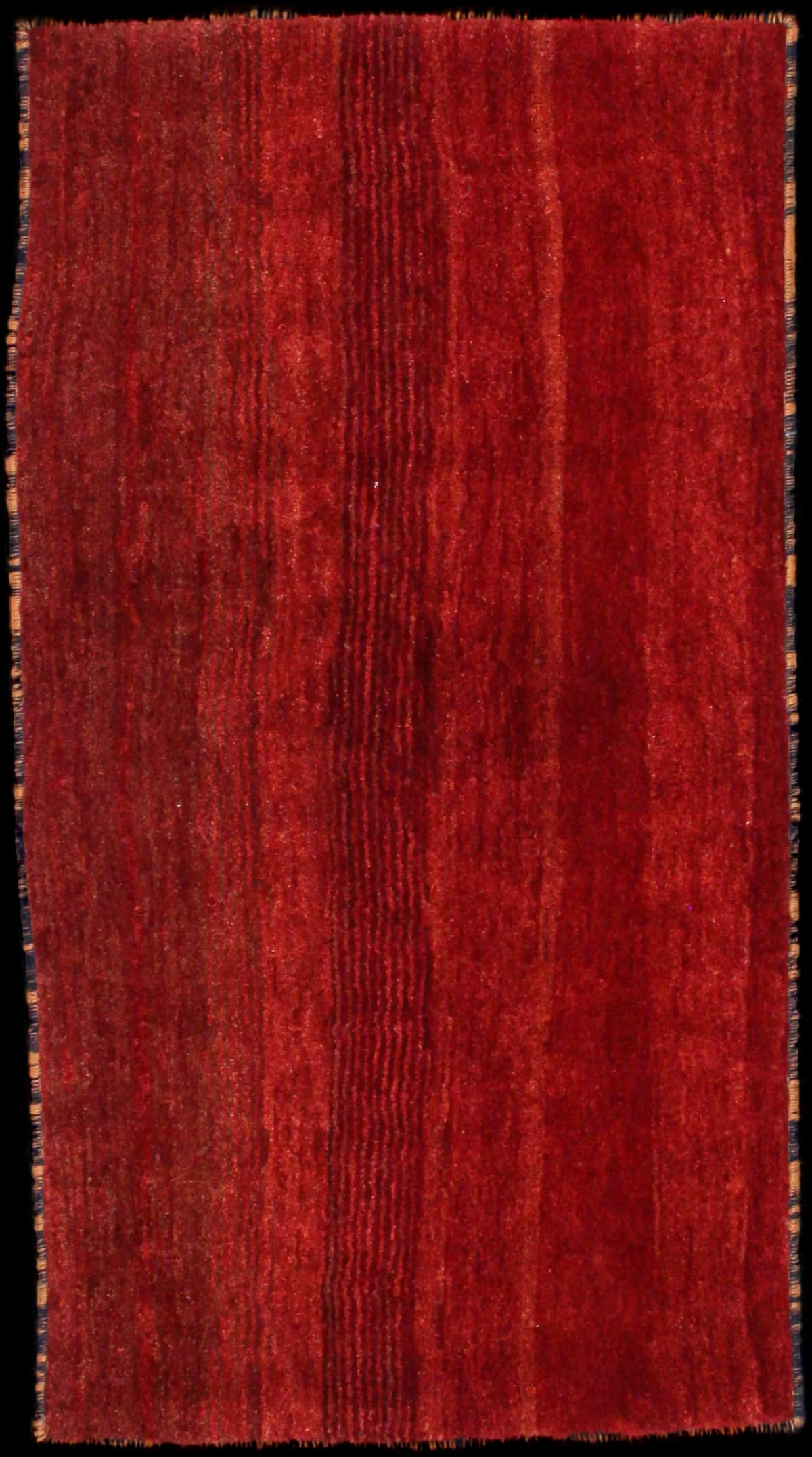 Persian rug of Gabbeh style in dimensions 156 centimeters length by 85 centimeters width with mainly red colors
