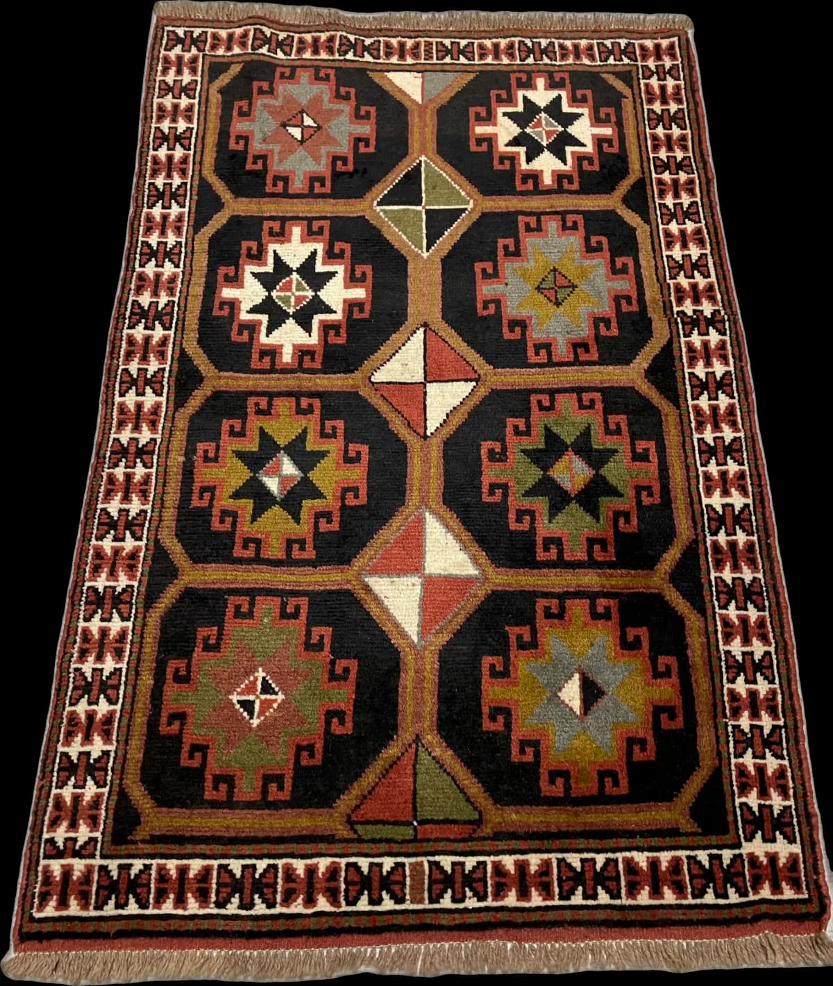 Perserteppich Quchan, orientalisch, 107x164 cm, überwiegend in Schwarz und Braun — Perspektive