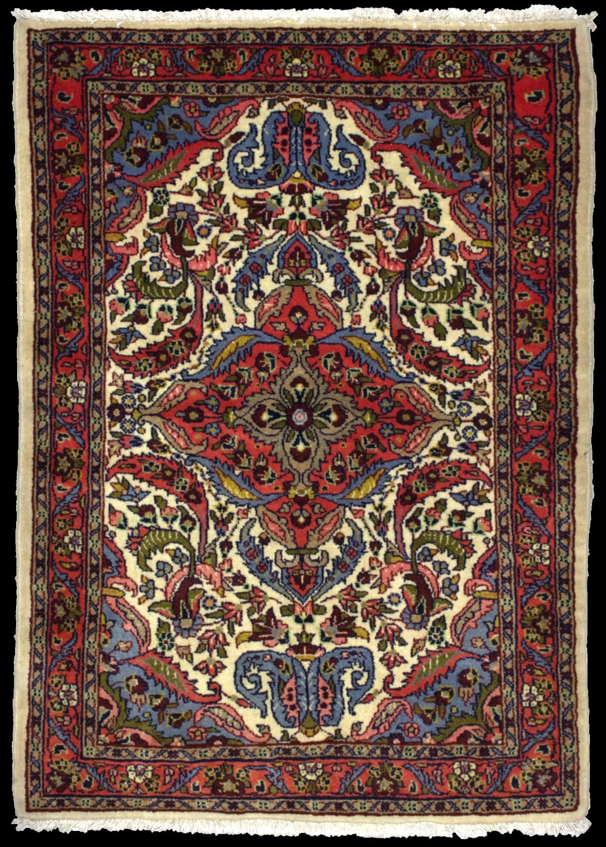 Persian rug in dimensions 140 centimeters length by 103 centimeters width with mainly red colors