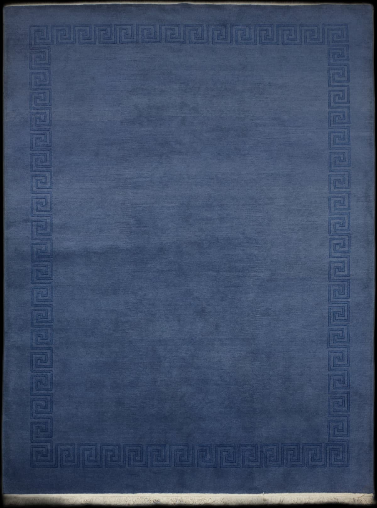Nepali rug of Tibetan style in dimensions 300 centimeters length by 200 centimeters width with mainly blue colors