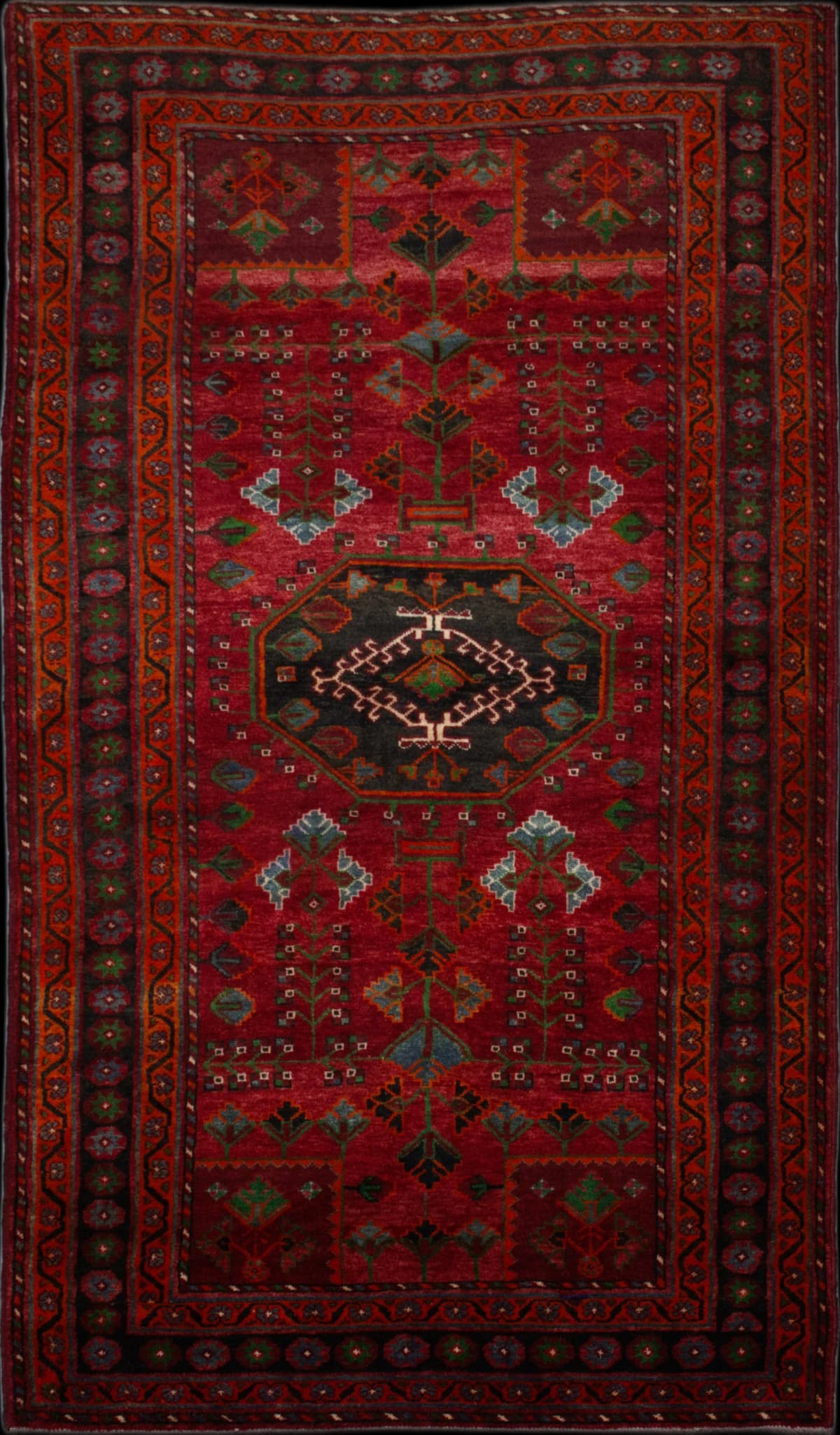 Persian rug in dimensions 288 centimeters length by 155 centimeters width with mainly red colors