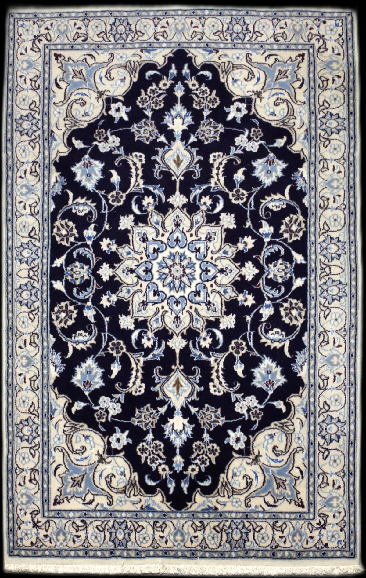 Persian rug in dimensions 207 centimeters length by 125 centimeters width with mainly beige and blue colors