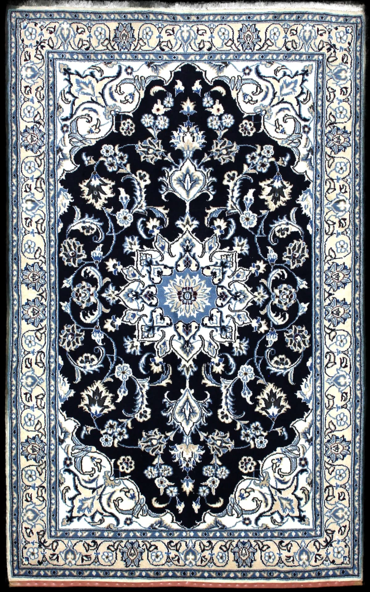 Persian rug of Nain style in dimensions 204 centimeters length by 125 centimeters width with mainly blue colors