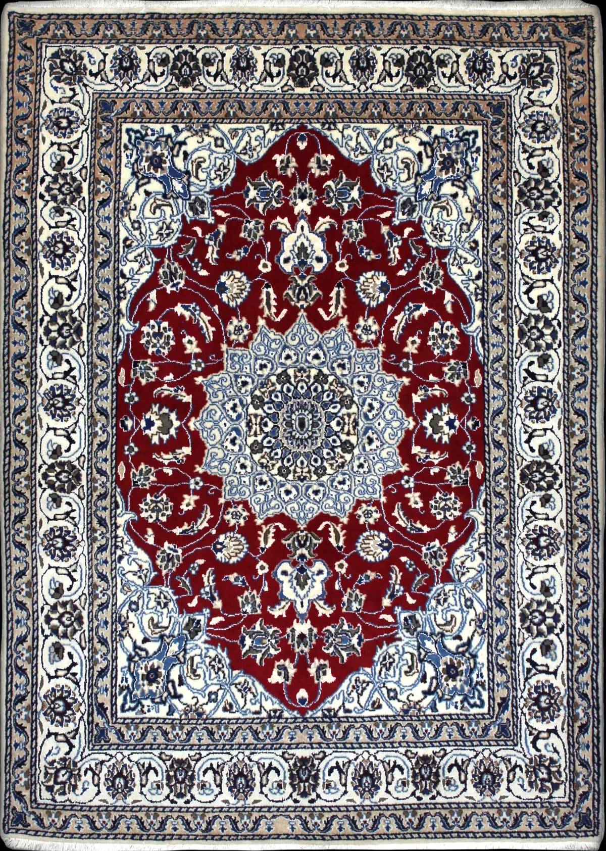 Persian rug of Nain style in dimensions 203 centimeters length by 140 centimeters width with mainly red and blue colors