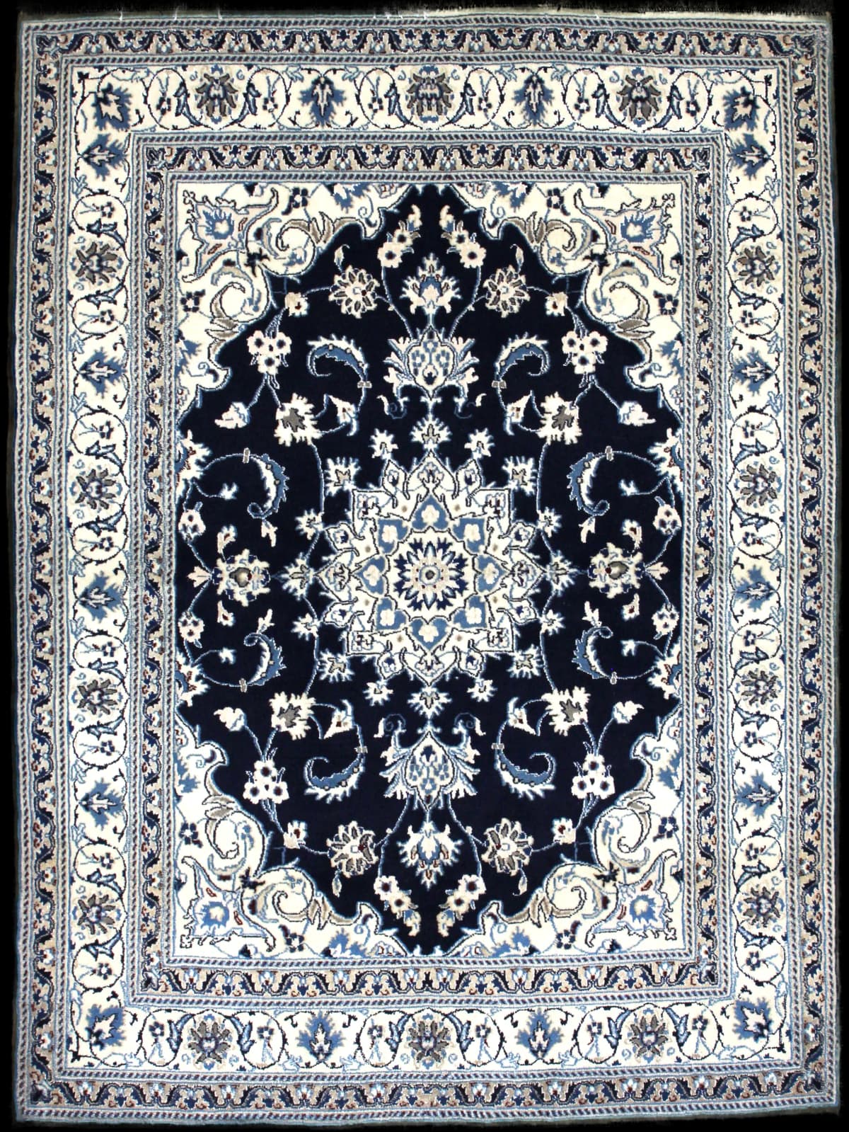 Persian rug of Nain style in dimensions 204 centimeters length by 148 centimeters width with mainly blue colors