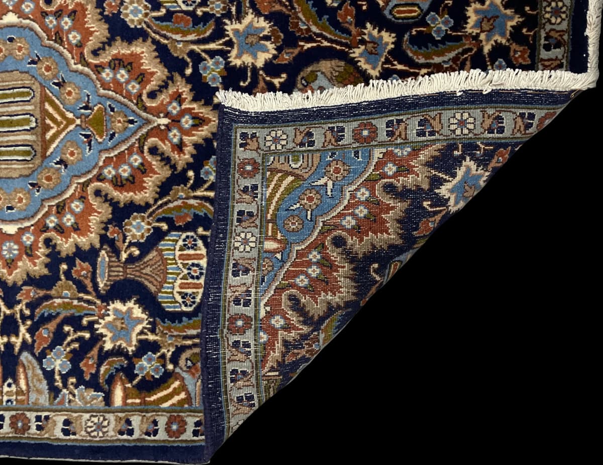 Tapis persan Kashmar, oriental, 107x183 cm, principalement bleu et noir — Plié