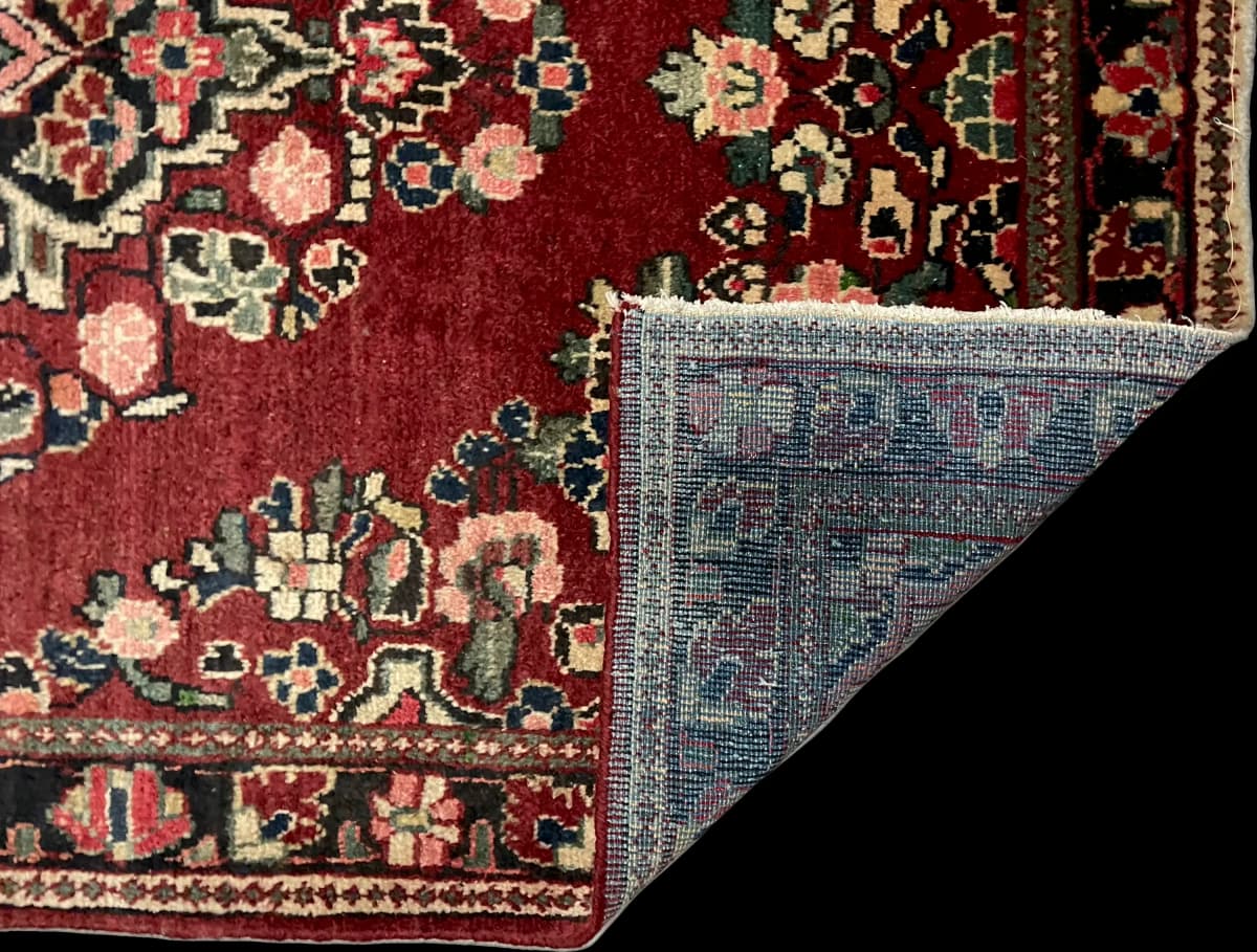 Perserteppich Arak, orientalisch, 126x204 cm, überwiegend in Rot — Gefaltet